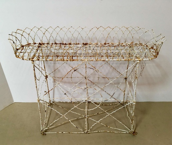ANTIQUE WIRE PLANT STAND ON CASTERS