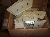 BOX LOT OF SWITCH PLATES AND SWITCHES PLUS