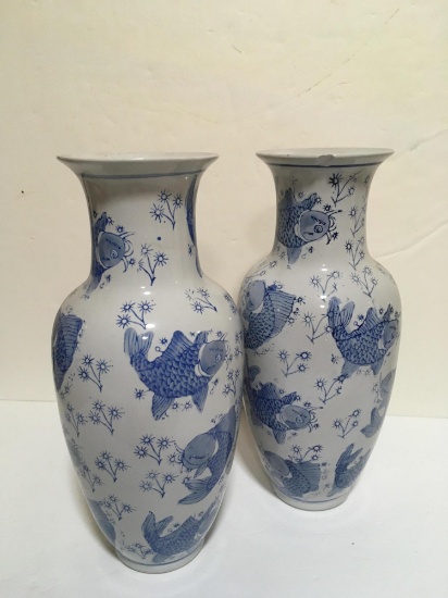 PAIR OF BLUE AND WHITE MANTLE VASES