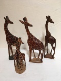 4 WOOD CARVED GIRAFFE FIGURES