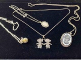 GROUP OF FOUR NECKLACES
