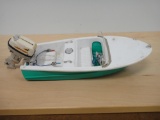 VINTAGE FLEET LINE  TOY MOTOR BOAT WITH JOHNSON OUTBOARD
