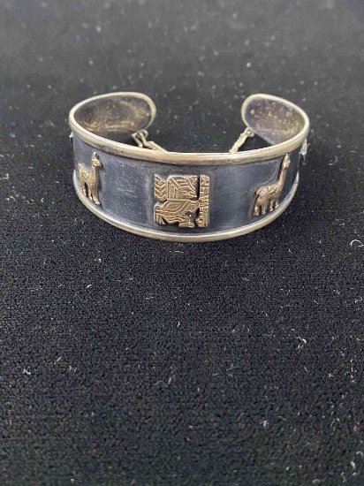 PERUVIAN GOLD AND STERLING BRACELET
