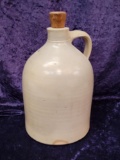 HANDLED POTTERY JUG WITH CORK STOPPER