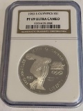 1983S OLYMPIC DOLLAR - GRADED BY NGC