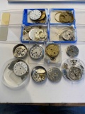 11+/- POCKET WATCH PARTS AND MOVEMENTS