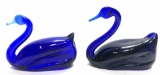 PAIR OF BLUE GLASS SWANS
