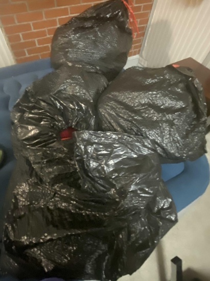 MYSTERY LOT FOUR BAGS OF CLOTHES