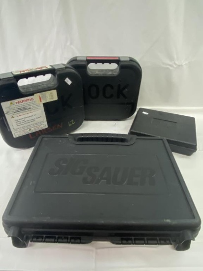 FOUR HARDSHELL HANDGUN CASES