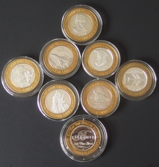 EIGHT (8) $10 .999 SILVER GAMING TOKENS