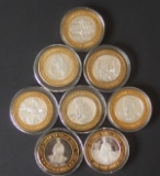 EIGHT (8) $10 .999 SILVER GAMING TOKENS