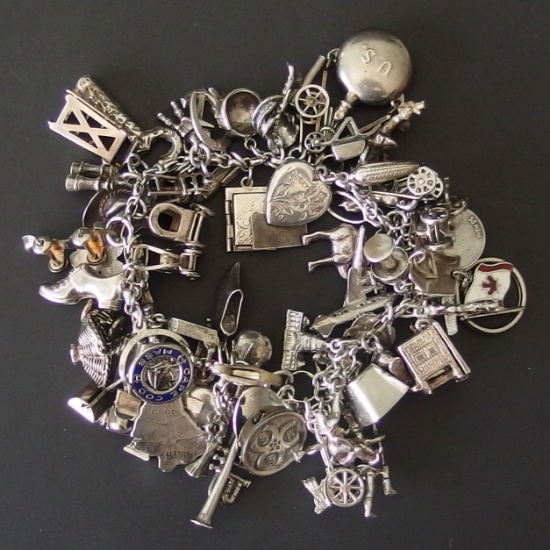 STERLING SILVER CHARM BRACELET