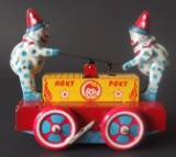 WYANDOTTE HOKY-POKY CLOWN HAND CAR TOY