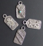 EARLY NAVAJO STERLING PENDANTS (4)