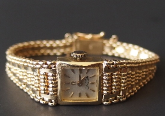 14KT GOLD LADIES OMEGA WRIST WATCH & BAND