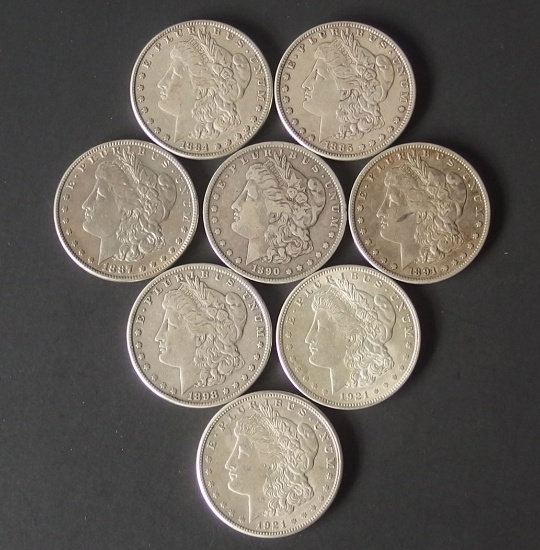 8 MORGAN SILVER DOLLAR COINS