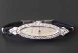 14KT GOLD DIAMOND BULOVA LADIES WATCH