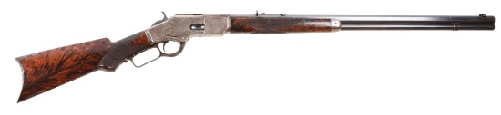 (A) Winchester Model 1873 Deluxe Lever Action Rifle.