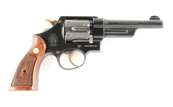 (C) S&W .38-44 Heavy Duty Revolver (1946).