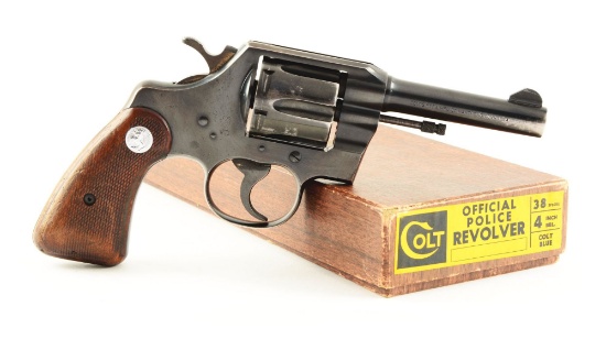 (C) Boxed Colt Official Police Double Action Revolver.