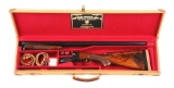 (C) Cased Winchester Model 21 Double Barrel 12 Bore Shotgun (1948).