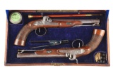 (A) Cased Pair of English Percussion Target Pistols by Richards.
