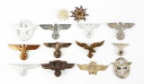 Lot of 14: Assorted German World War II Cap Badges.