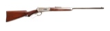 (C) Winchester Model 1894 Deluxe Lever Action Rifle.