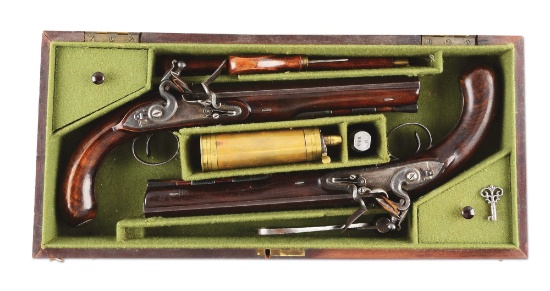 (A) Cased Pair of Flintlock Dueling Pistols by Clarke of Dublin.
