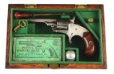 (A) Cased Colt Open Top Pocket Model Revolver.