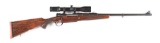 (C) Holland & Holland Modele De Luxe .375 H&H Mauser Sporting Rifle with Scope in its case with Trav