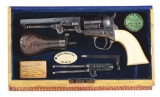 (A) EXTRAORDINARY PRESENTATION BOOK CASED ENGRAVED COLT MODEL 1849 POCKET PERCUSSION REVOLVER