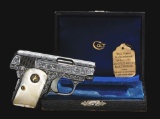 (C) EXTRAORDINARY CASED COLT MODEL 1908 .25 ACP AUTOMATIC PISTOL MASTERFULLY ENGRAVED AND SIGNED BY