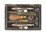 (A) CASED DIMINUTIVE PAIR OF CONTINENTAL FLINTLOCK POCKET PISTOLS WITH ENGRAVED SIDELOCKS, SPURRED B