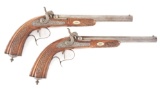 (A) A FINE PAIR OF BELGIAN PERCUSSION TARGET/DUELING PISTOLS SIGNED BY E.F. GRUNDMANN IN OLDENBURG.