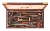 (A) SPLENDID AND VERY RARE CASED PAIR OF FORSYTH PATENT SLIDING PRIMER DUELING PISTOLS BY GEORGE DAV
