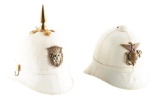 LOT OF 2: TWO US MARINE CORP DRESS PITH HELMETS.