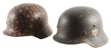 LOT OF 2: GERMAN WORLD WAR II HEER M40 SD AND LUFTWAFFE M40 CAMO HELMETS.