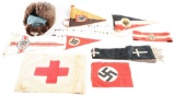 LOT OF 37: THIRD REICH STICKPINS, FLAGS, AND POLIZEI WINTER CAP.