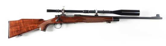 (M) DELUXE ENGRAVED REMINGTON MODEL 700 WITH FECKER SCOPE.