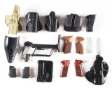 LARGE LOT OF OEM ACCESSORIES INCLUDING LASERS, GRIPS, HOLSTERS.