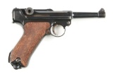 (C) 1923 DWM COMMERCIAL LUGER SEMI-AUTOMATIC PISTOL.