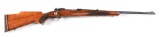 (C) PRE-64 WINCHESTER MODEL 70 BOLT ACTION RIFLE (1950).