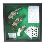 (C) LOT OF THREE: IMPRESSIVE GAMBLERS WALL DISPLAY WITH POCKET GUNS.