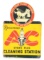 AC Spark Plugs Cleaning Station Tin Flange Sign W/ Sparky Graphic.