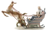 Lladro Figurine of Reindeer Pulling Sled with Woman and Child Inside.
