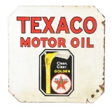 Texaco Motor Oil Porcelain Sign W/ Pouring Can Graphic.