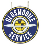 Oldsmobile Motor Cars Service Porcelain Sign W/ Globe Graphic & Original Metal Ring.