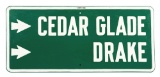 Cedar Glade & Drake Stamped Steel Directional Highway Sign.