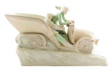 Porcelain Automobile Figurine with Driver and Passenger.